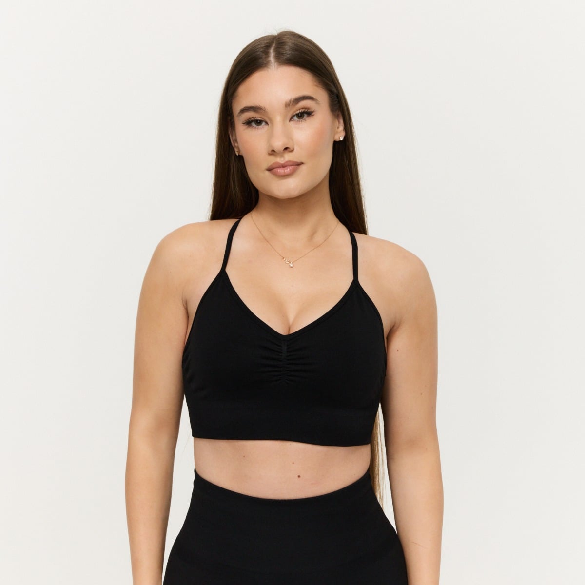 Sculpt varrásmentes sportmelltartó Black - GymBeam